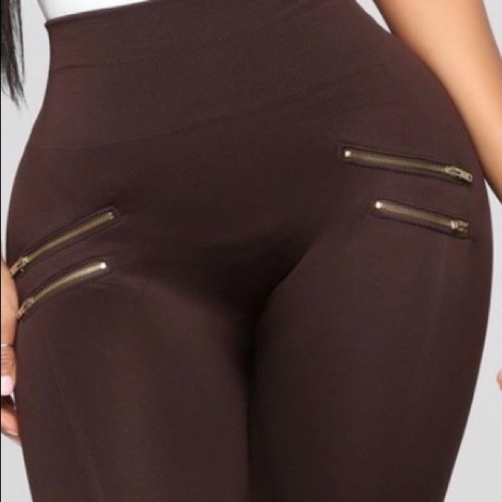 Chocolate leggings with gold zippers